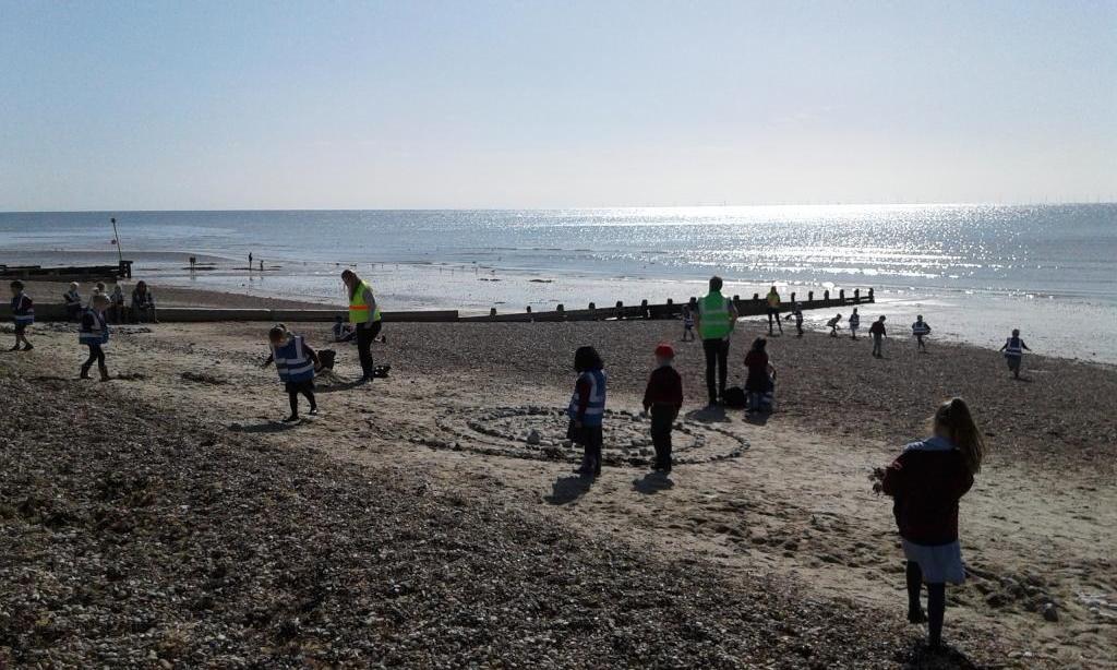 Pupils exploring on the beach